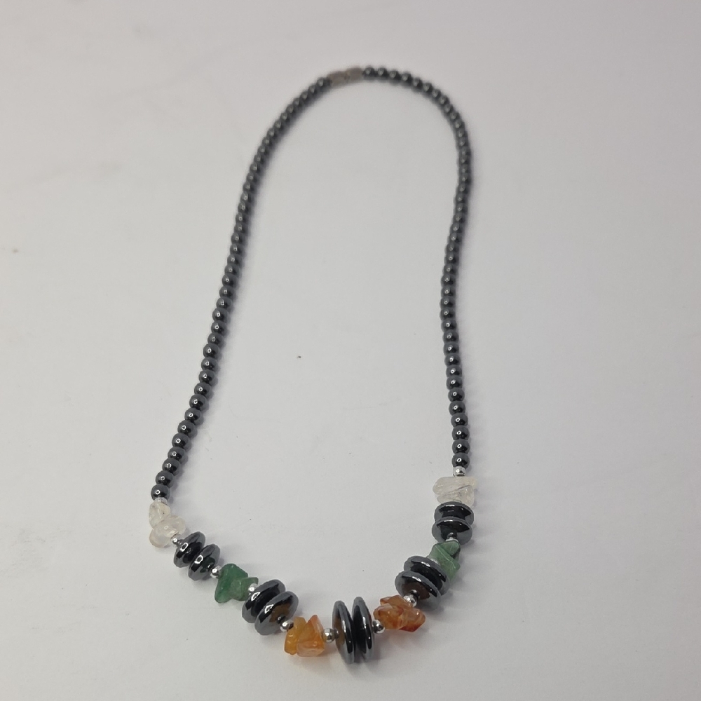Vintage hematite beaded necklace featuring multi-colored natural stone chips
